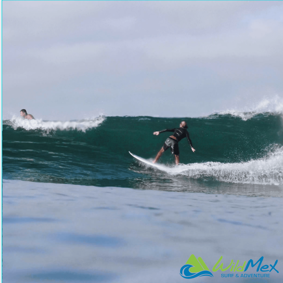 Surfer doing tricks on the surfboard