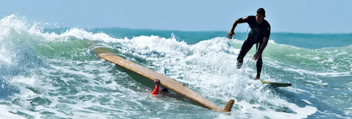 Aprendiendo los turtle rolls durante surf en Punta Mita