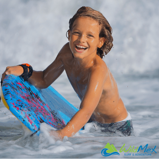 Surf lessons for kids with WildMex put smiles on all faces…