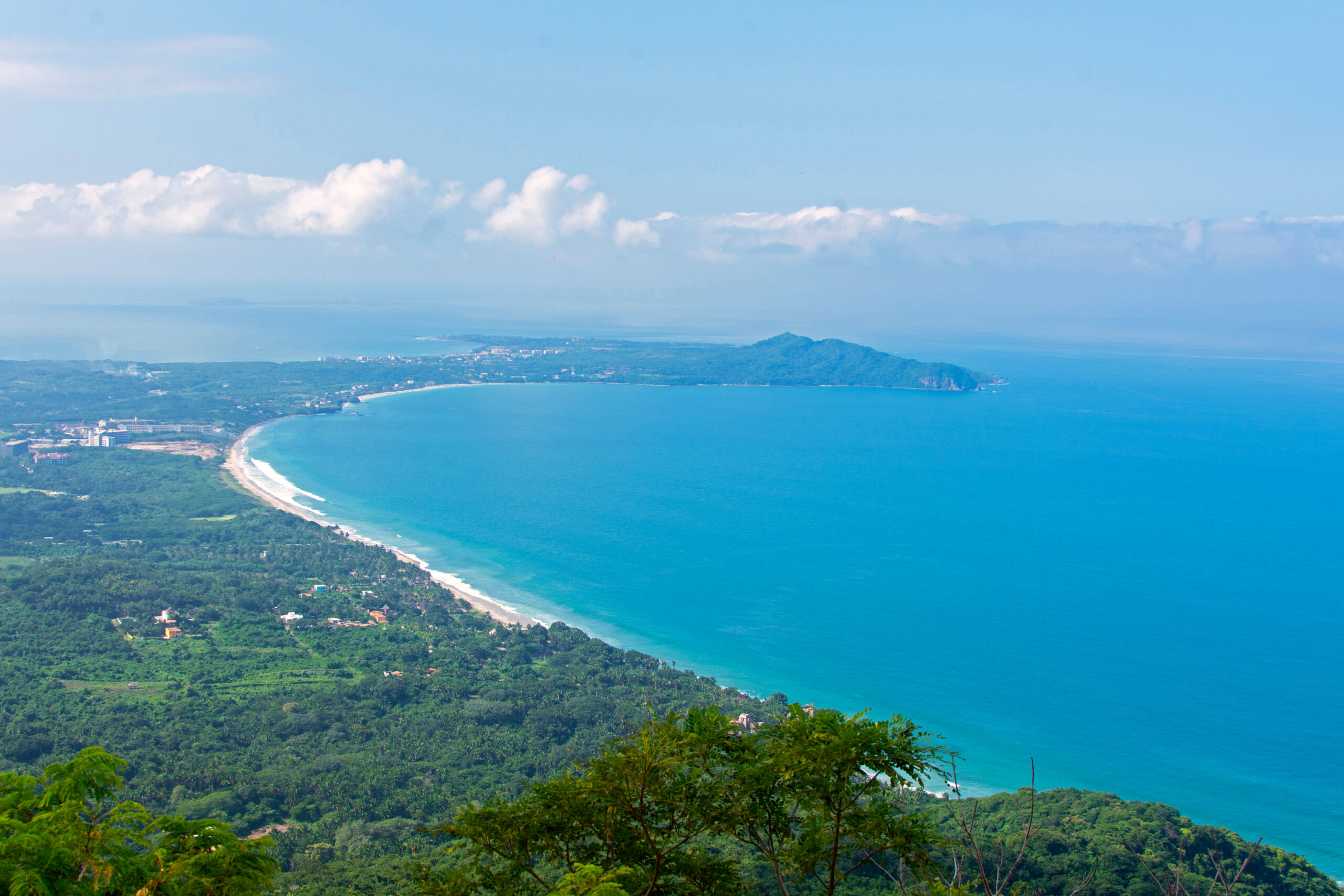 Bahía de Banderas summer view Aerial view of Bahía de Banderas with lush vegetation during summer