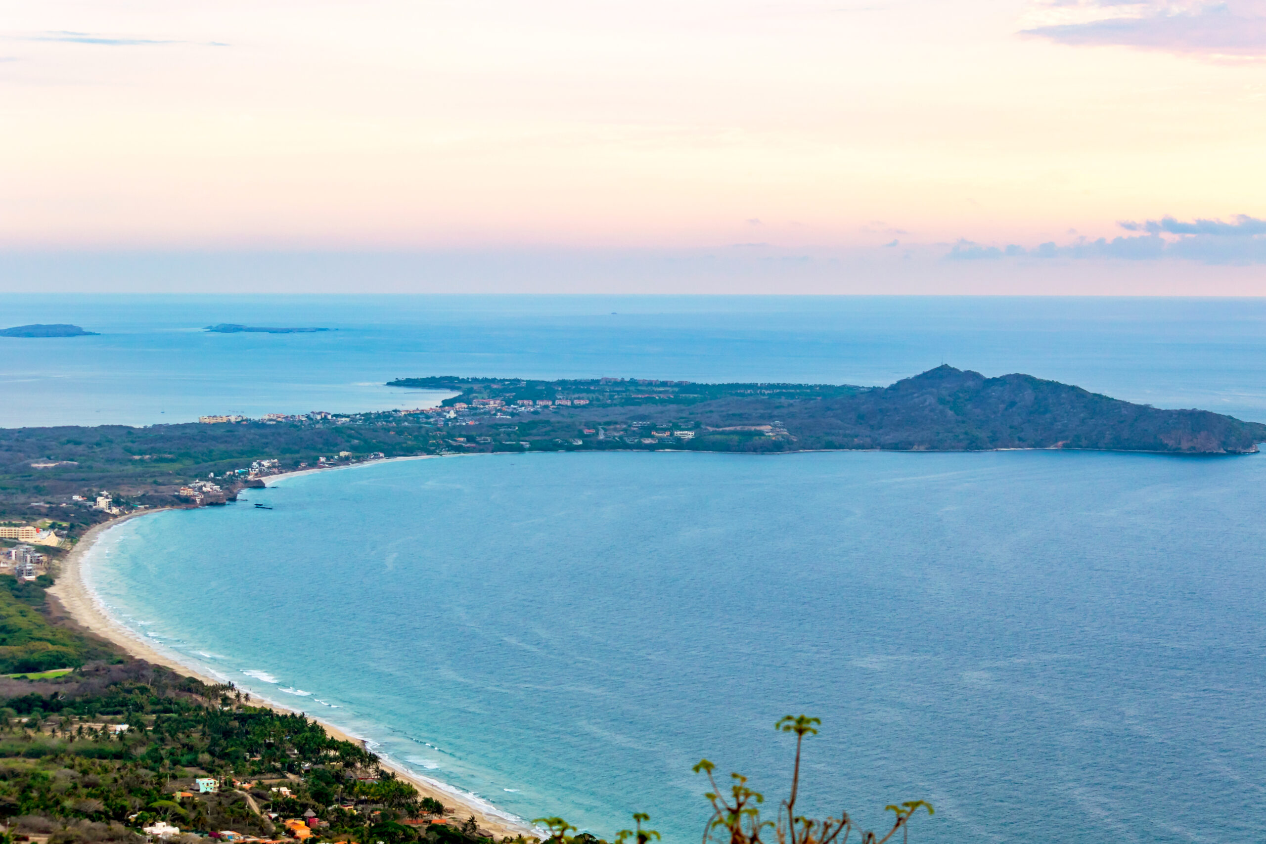 Summer sunset Bahía de Banderas Aerial view of Bahía de Banderas with summer sunset sky