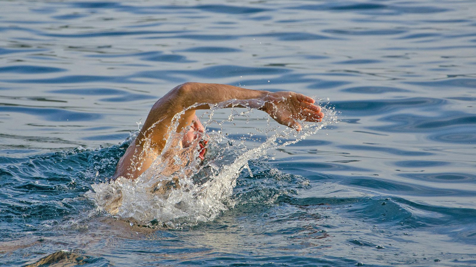 Swimming in a pool may seem calm and passive, but trust us, it’ll be a lifesaver for learning to surf in Mexico!  