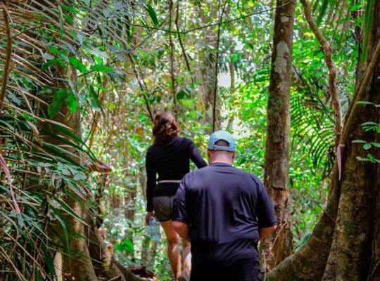 Couple hiking into the jungle trail in Sayulita during WildMex tour