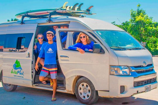 WildMex surf shuttle van transporting guests from San Pancho to La Lancha beach