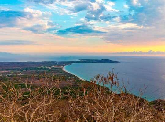 Sunset over the bay seen from Monkey Mountain summit in Punta Mita
