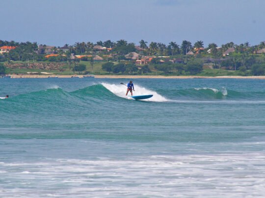 Man paddle boarding in Punta Mita during WildMex SUP lesson